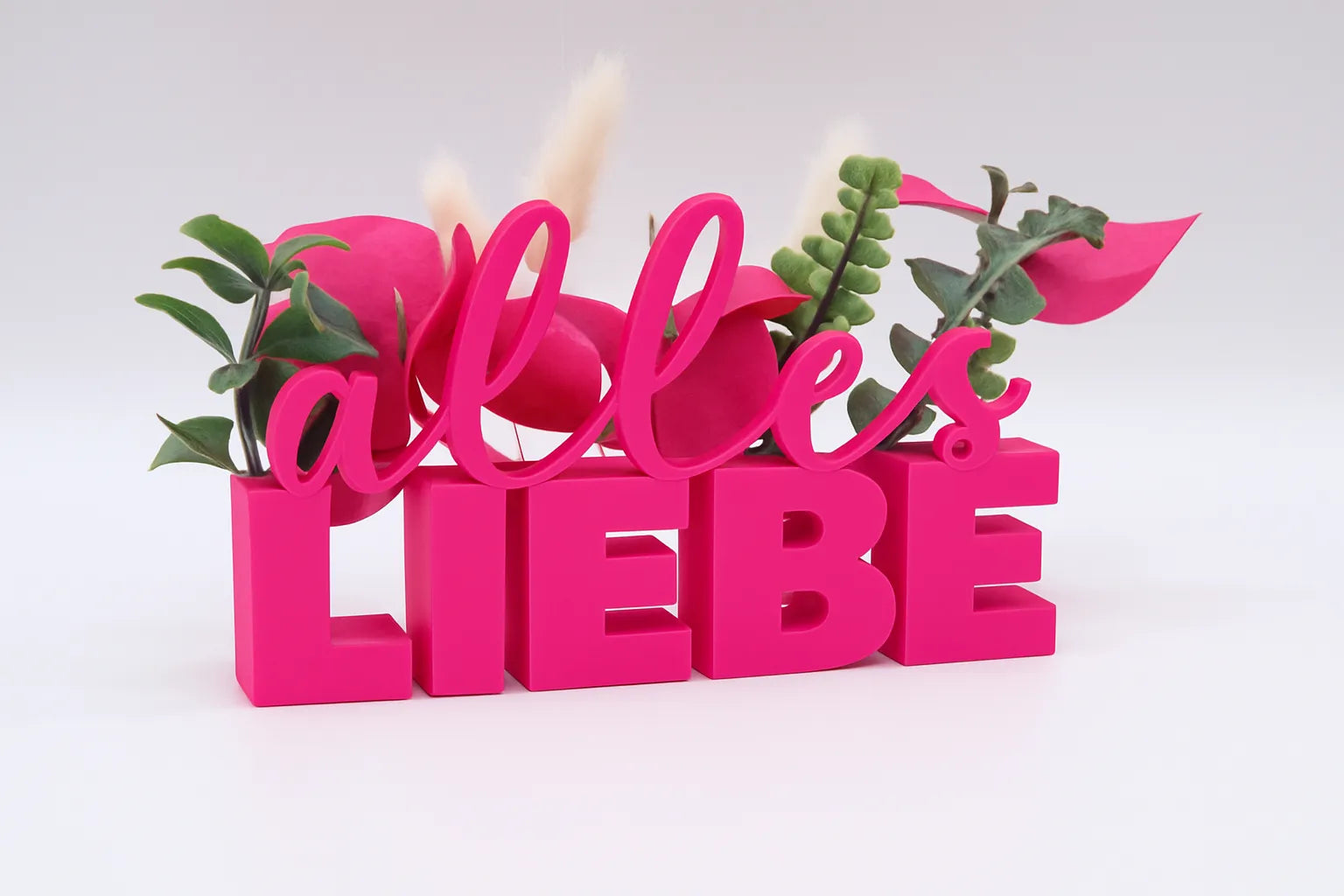 LiebeDeluxe® 3D-Aufsteller mit „Alles Liebe“-Schriftzug in Fuchsia, mit Öffnungen für Blumen oder Geldscheine