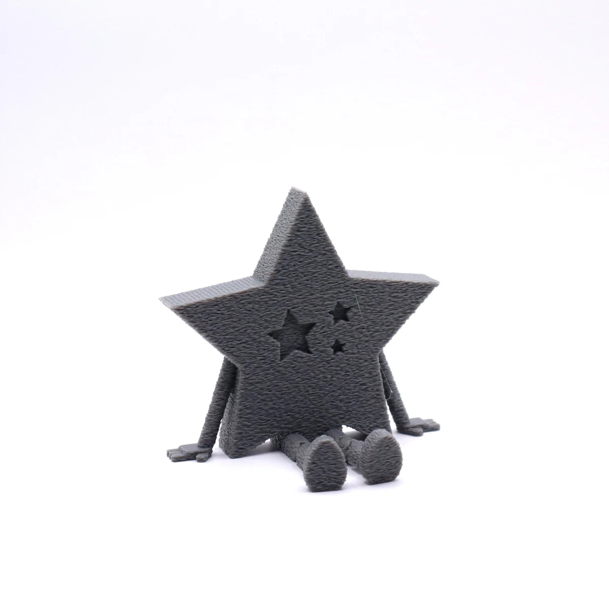 Chilluminati Sitzstern in Grau – stilvolle 3D-gedruckte Weihnachtsdeko mit Beinen und Sternausschnitt. Minimalistisch, charmant und voller Mudivo-Magie. ✨