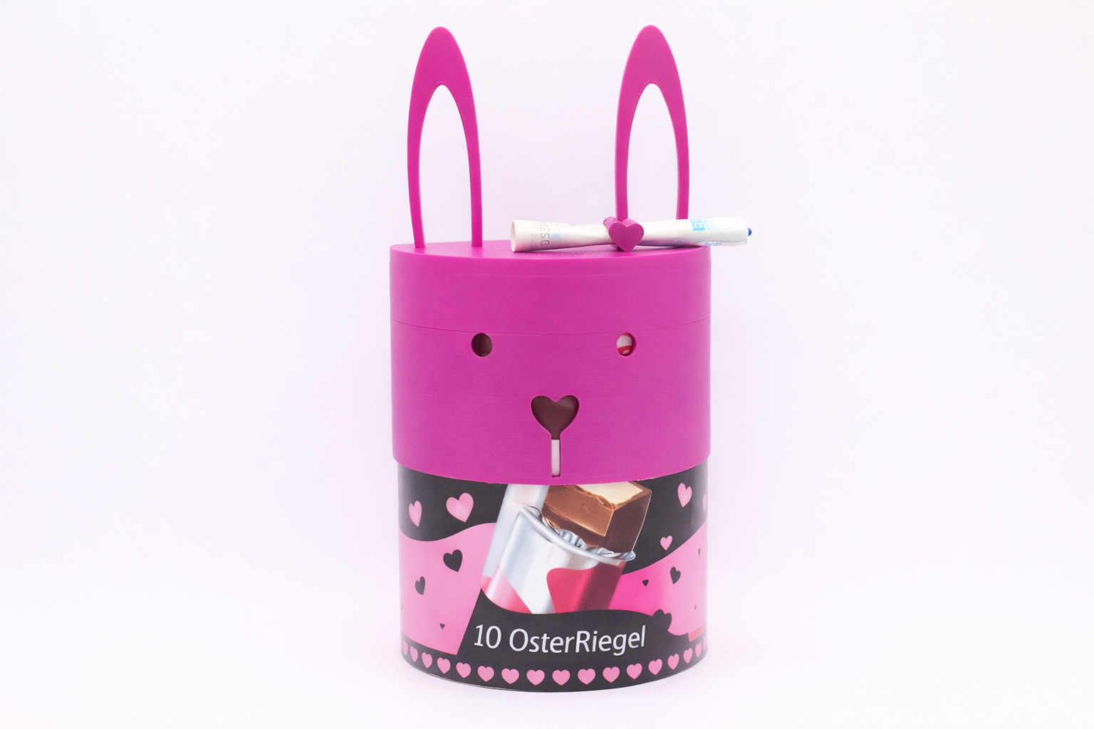 ChocoMask Bunny Schokoriegel Geschenk zu Ostern in Fuchsia – kreative Osterverpackung für Schokolade oder kleine Geldgeschenke von MUDIVO.