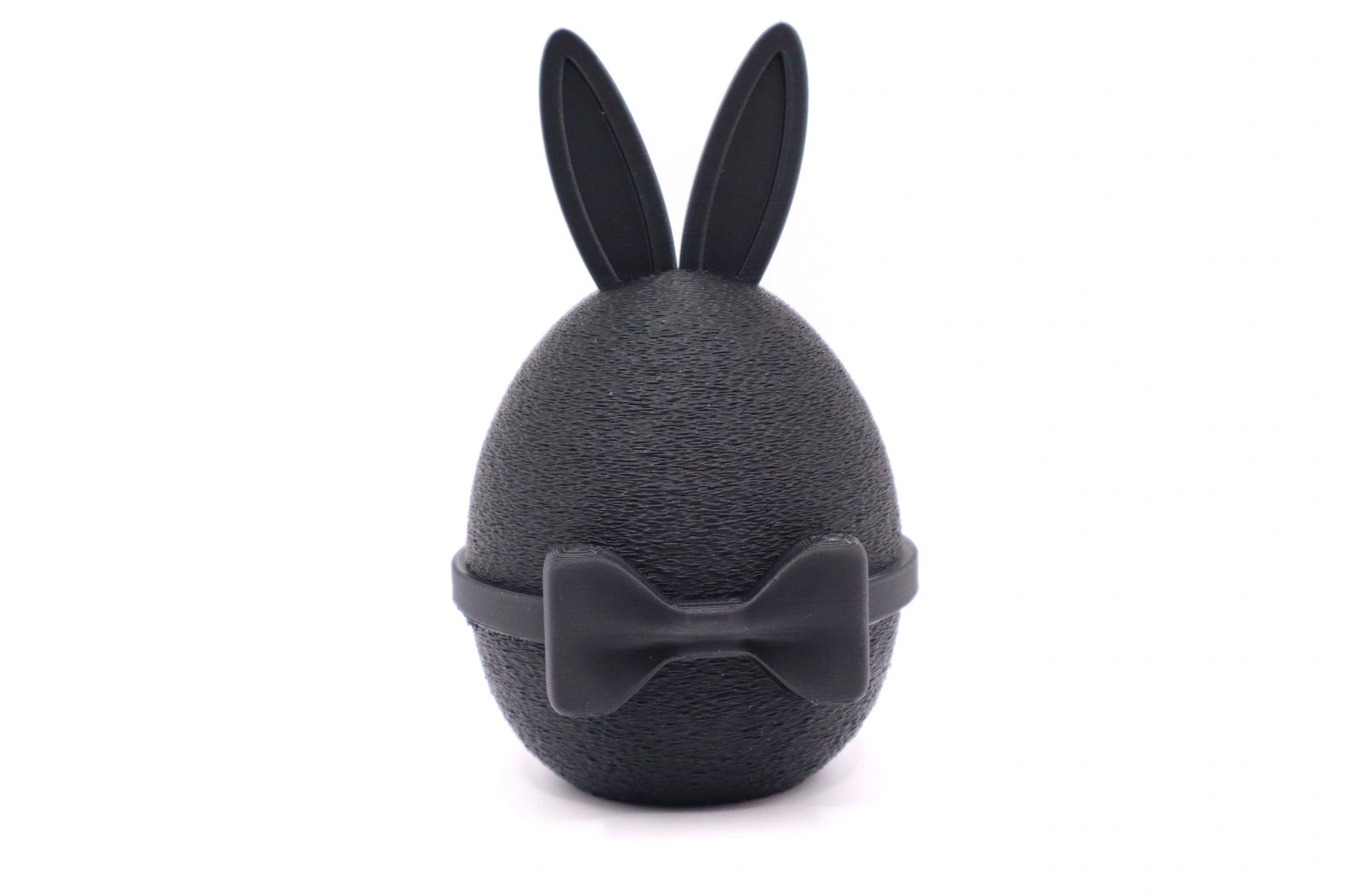 GentleEgg Design-Osterei mit Hasenohren und Fliege in Schwarz – modernes 3D-Druck Designobjekt von MUDIVO