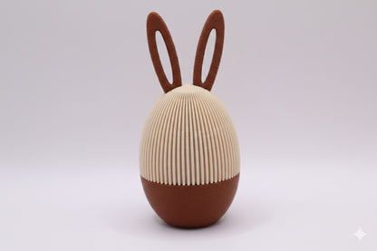 Arcana Egg zweifarbig in Braun und Beige mit Hasenohren, minimalistisches zweiteiliges 3D-Druck Designobjekt als stilvolle Osterdekoration