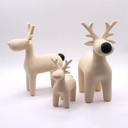 Drei beige Rentiere mit schwarzer Nase und schwarzem Hinterteil – minimalistisches Deko-Bundle im Skandi-Stil
