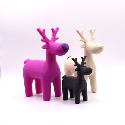 Stylishes Rentier-Trio in Fuchsia, Beige und Schwarz – moderne Weihnachtsdeko von Mudivo