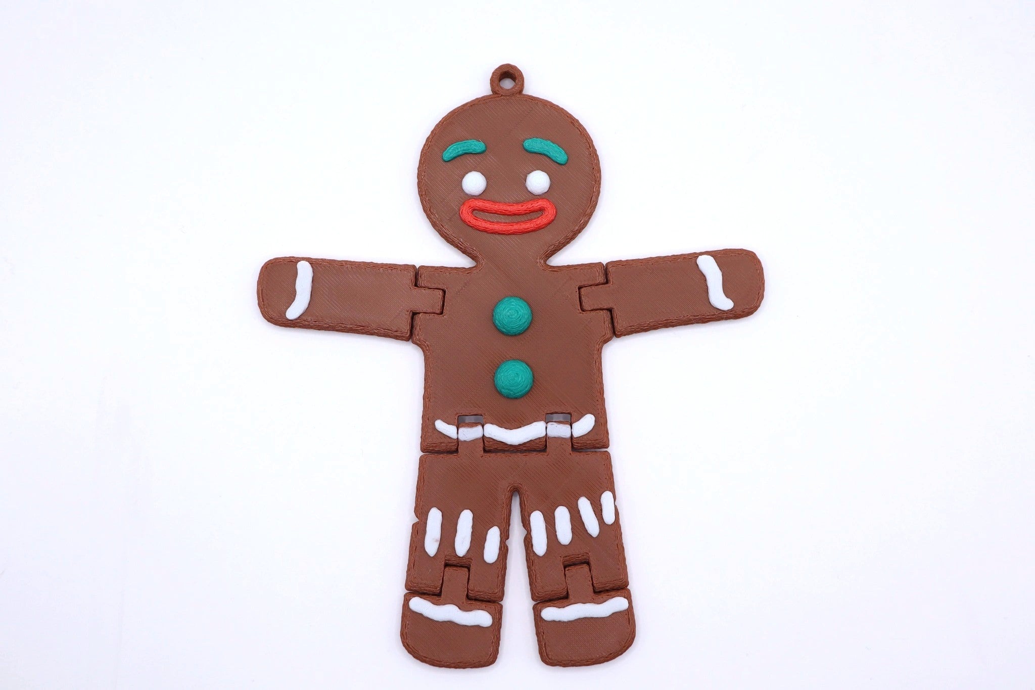 Mudivo GingerMood – bewegliche Lebkuchenfigur mit Aufhängering in flacher Ansicht. Süße Weihnachtsdeko zum Aufhängen oder Hinsetzen. ✨