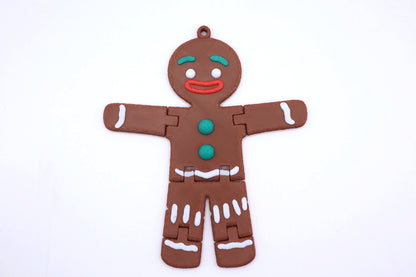 Mudivo GingerMood – bewegliche Lebkuchenfigur mit Aufhängering in flacher Ansicht. Süße Weihnachtsdeko zum Aufhängen oder Hinsetzen. ✨