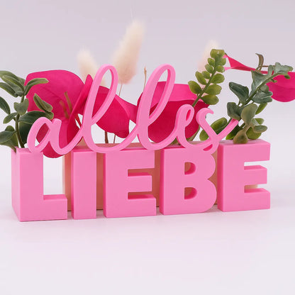 LiebeDeluxe® 3D-Aufsteller mit „Alles Liebe“-Schriftzug in Rosa, mit Öffnungen für Blumen oder Geldscheine