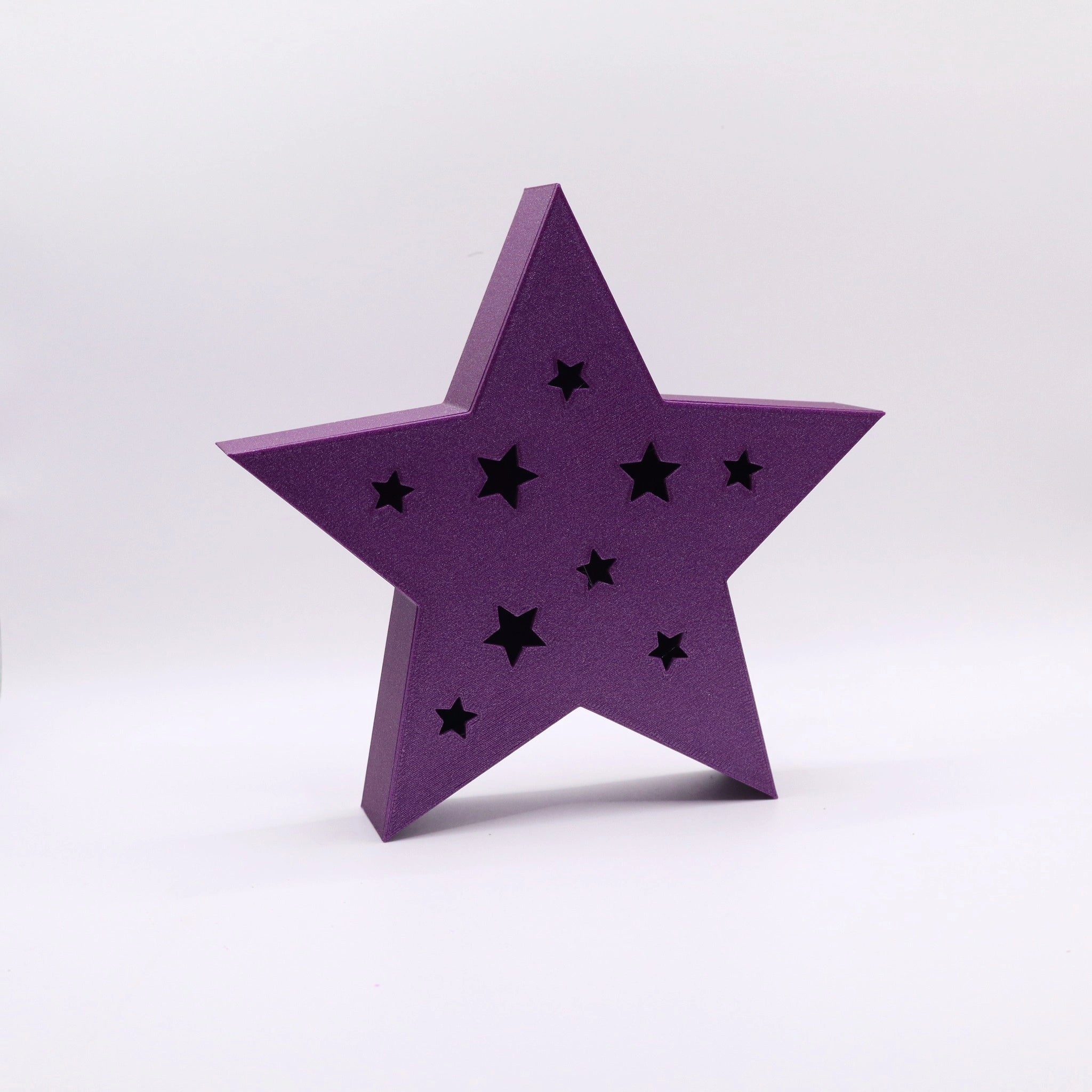SilentStar in Lila – 3D-gedruckter Stern mit filigranen Ausschnitten, stilvolle Weihnachtsdeko von Mudivo