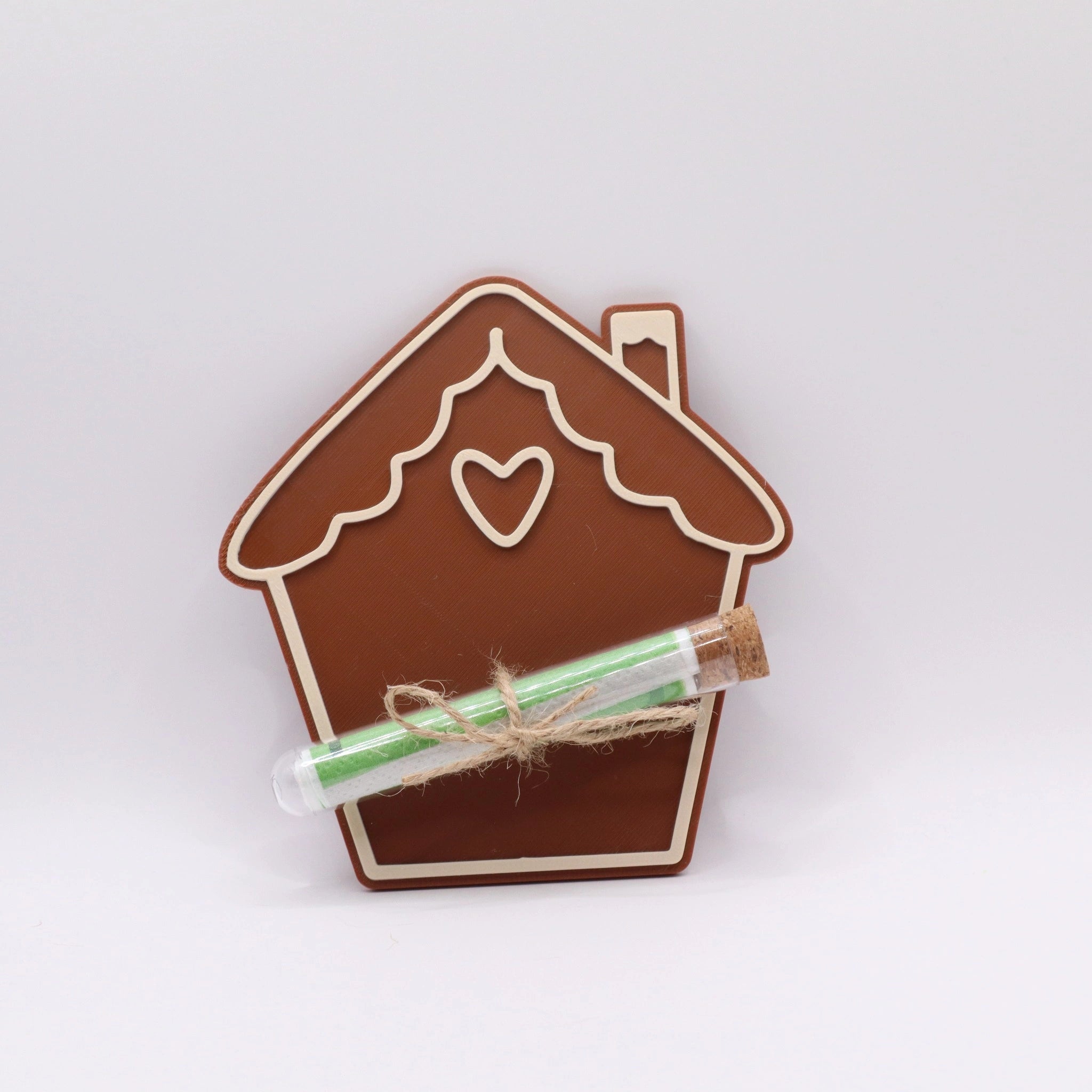 WunschWerk Karte „WinterNest“ – Lebkuchenhaus mit Herz und Reagenzglas – liebevolles Weihnachtsgeschenk von Mudivo